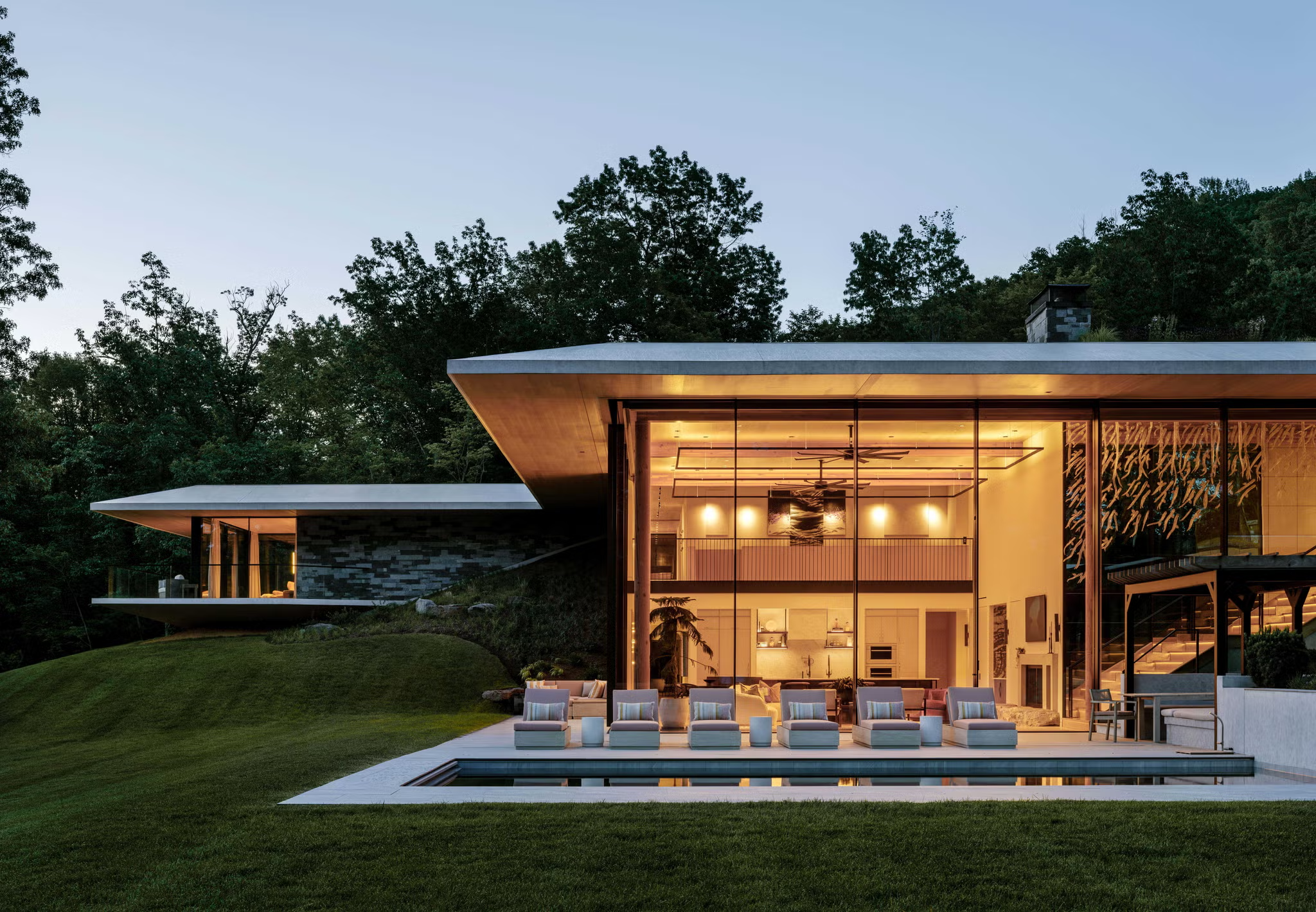 A Mountainside Home Hidden Within the Landscape, Filled with Secret Spaces